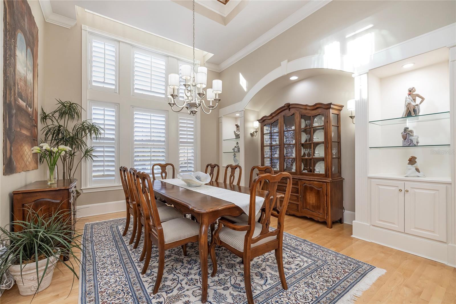 Spacious dining room with ceiling open to second floor.