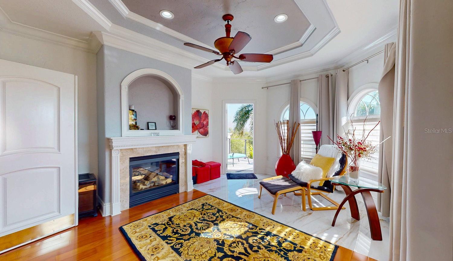 Primary Bedroom with Sitting Room, private balcony overlooking Tampa Bay, En-suite Primary Bathroom with oversized Walk in Closed