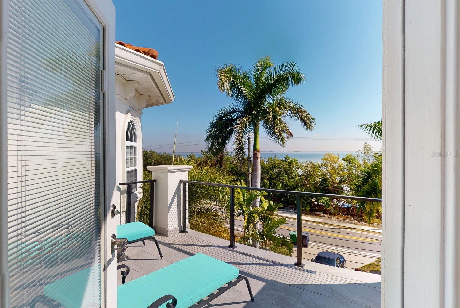 Primary Bedroom with Sitting Room, private balcony overlooking Tampa Bay, En-suite Primary Bathroom with oversized Walk in Closed