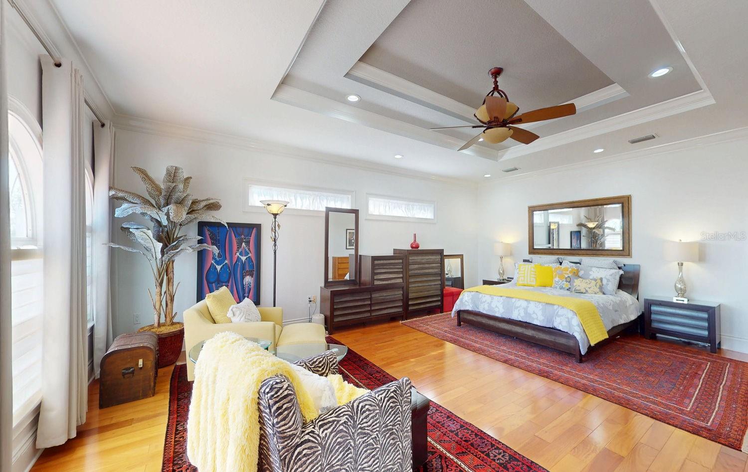 Primary Bedroom with Sitting Room, private balcony overlooking Tampa Bay, En-suite Primary Bathroom with oversized Walk in Closed