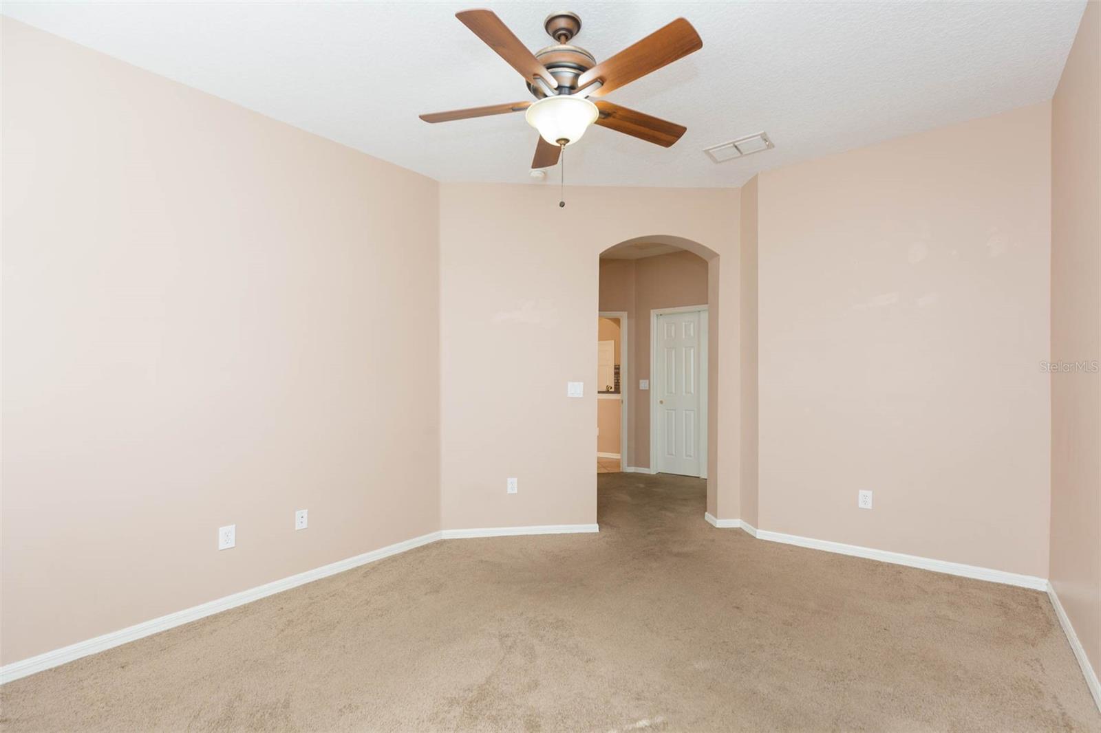 His and hers closets at entry to the primary bedroom