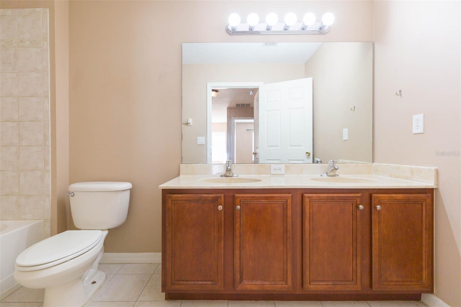 Bath #2 upstairs with tub and double sink