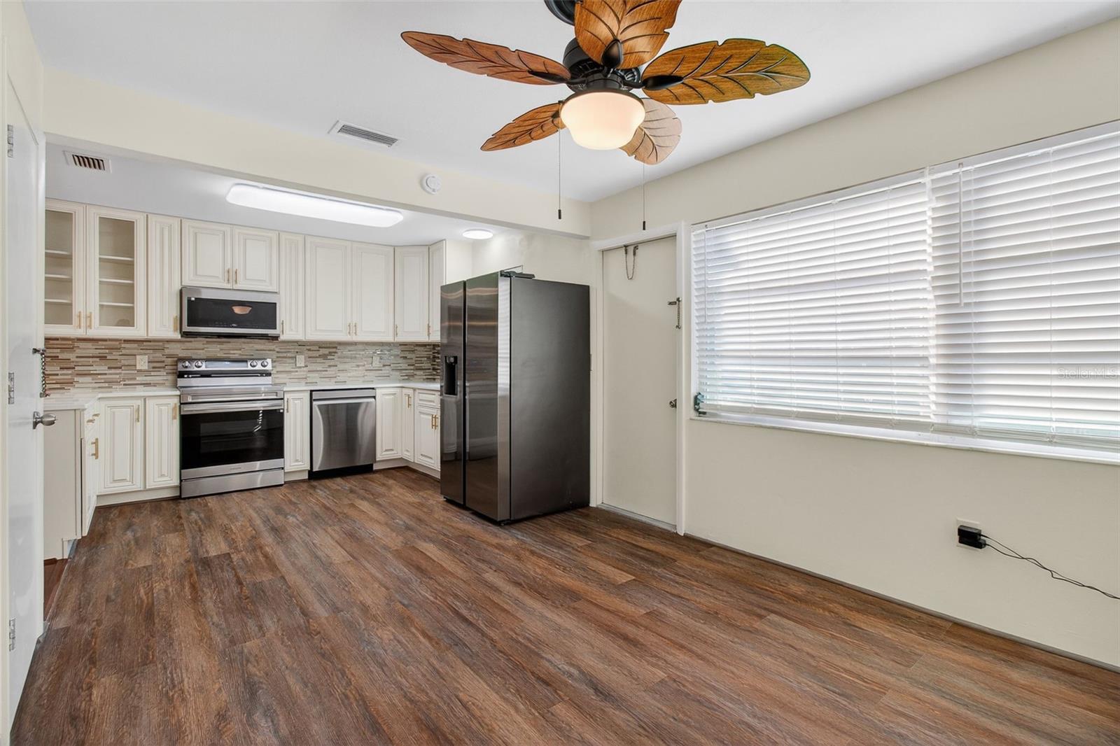 kitchen wide open to dining area