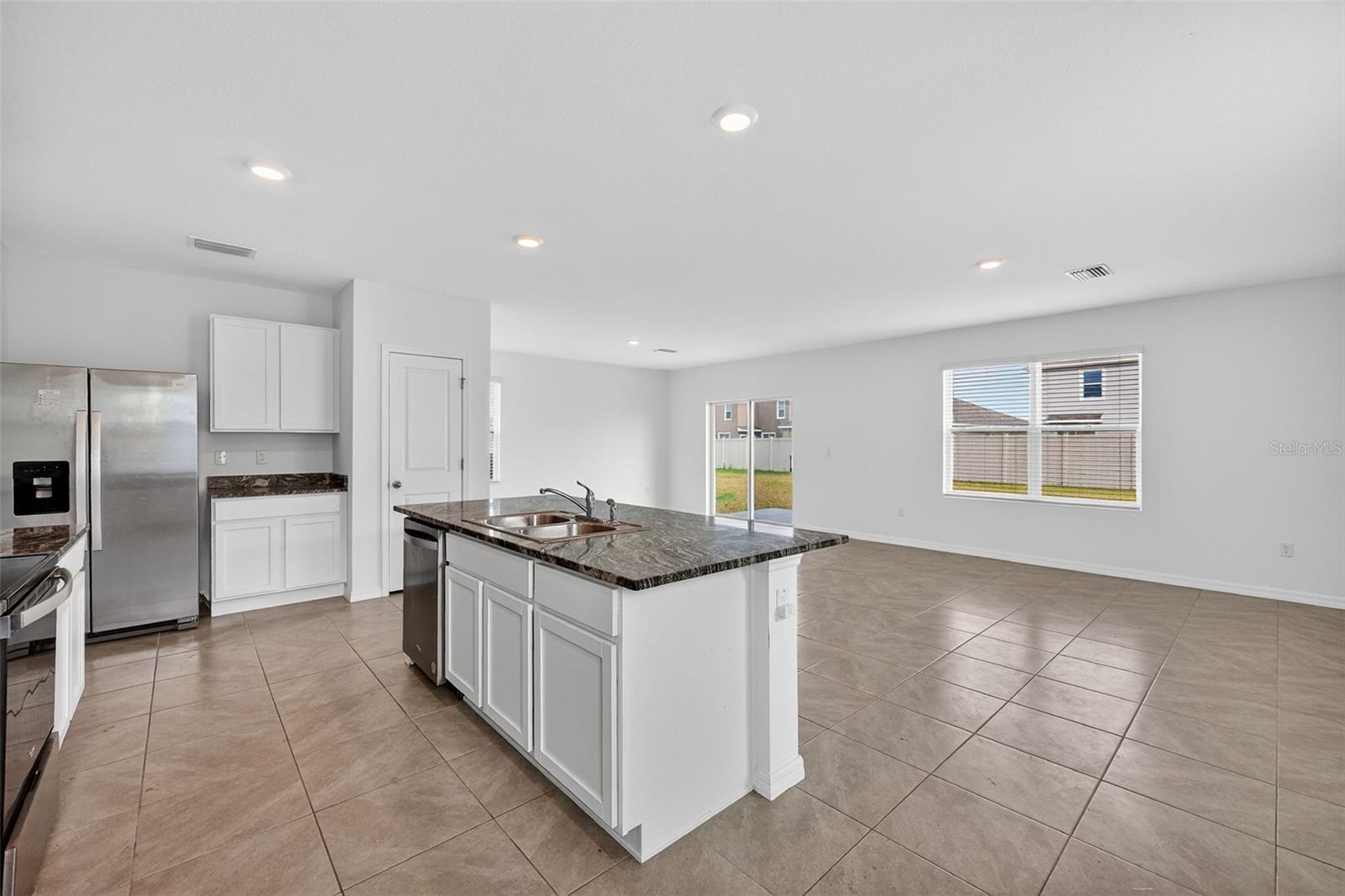 Kitchen and Great Room, Slider to  Patio