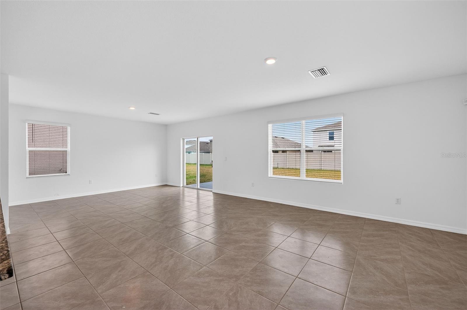 Huge Great Room with Sliders to Patio and back yard