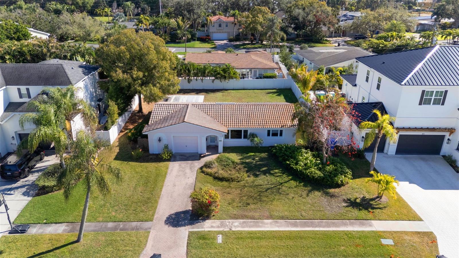 Direct front ariel and lot view