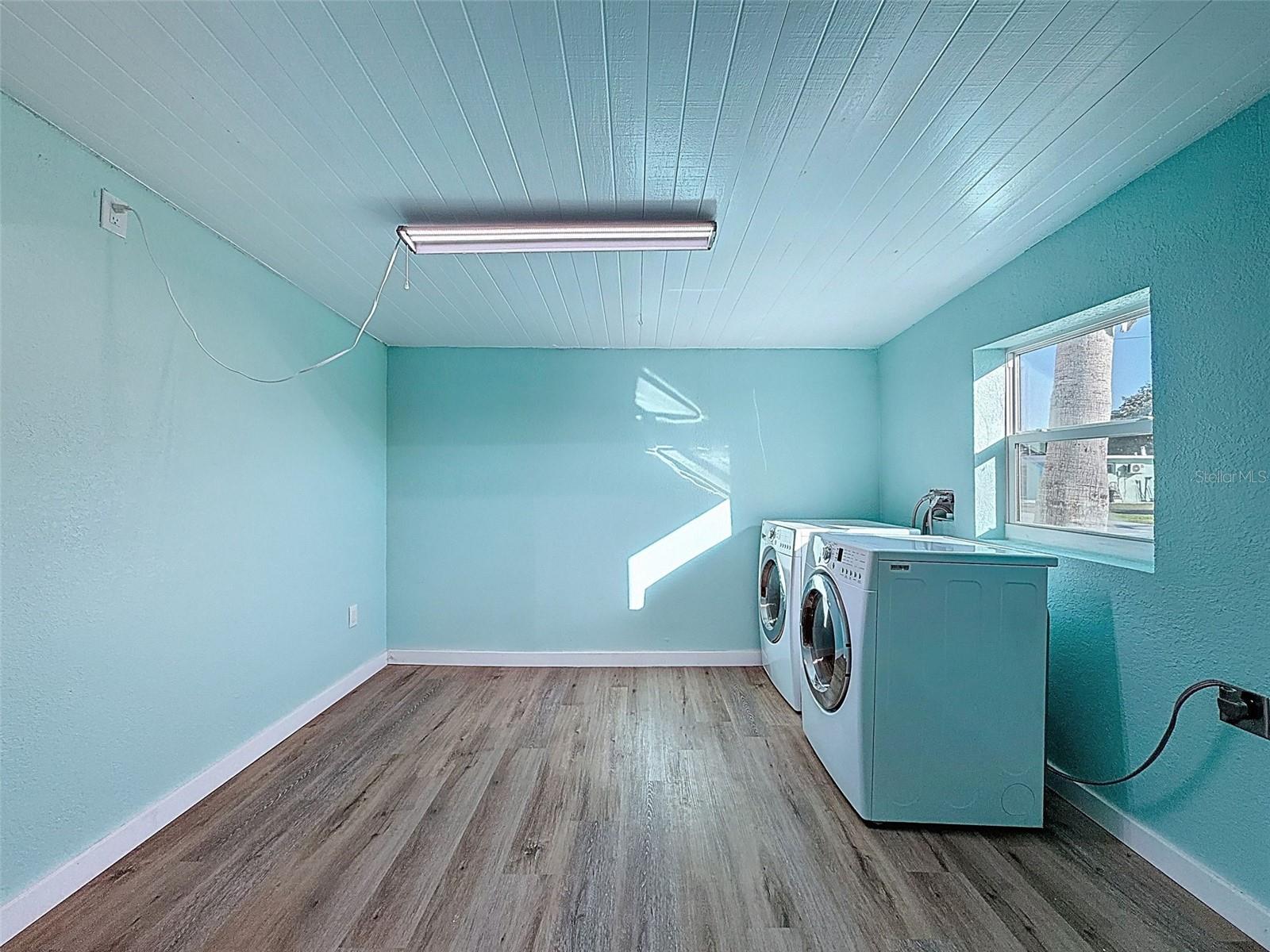 THIS LAUNDRY ROOM IS HUGE.  POSSIBILITIES ARE ENDLESS