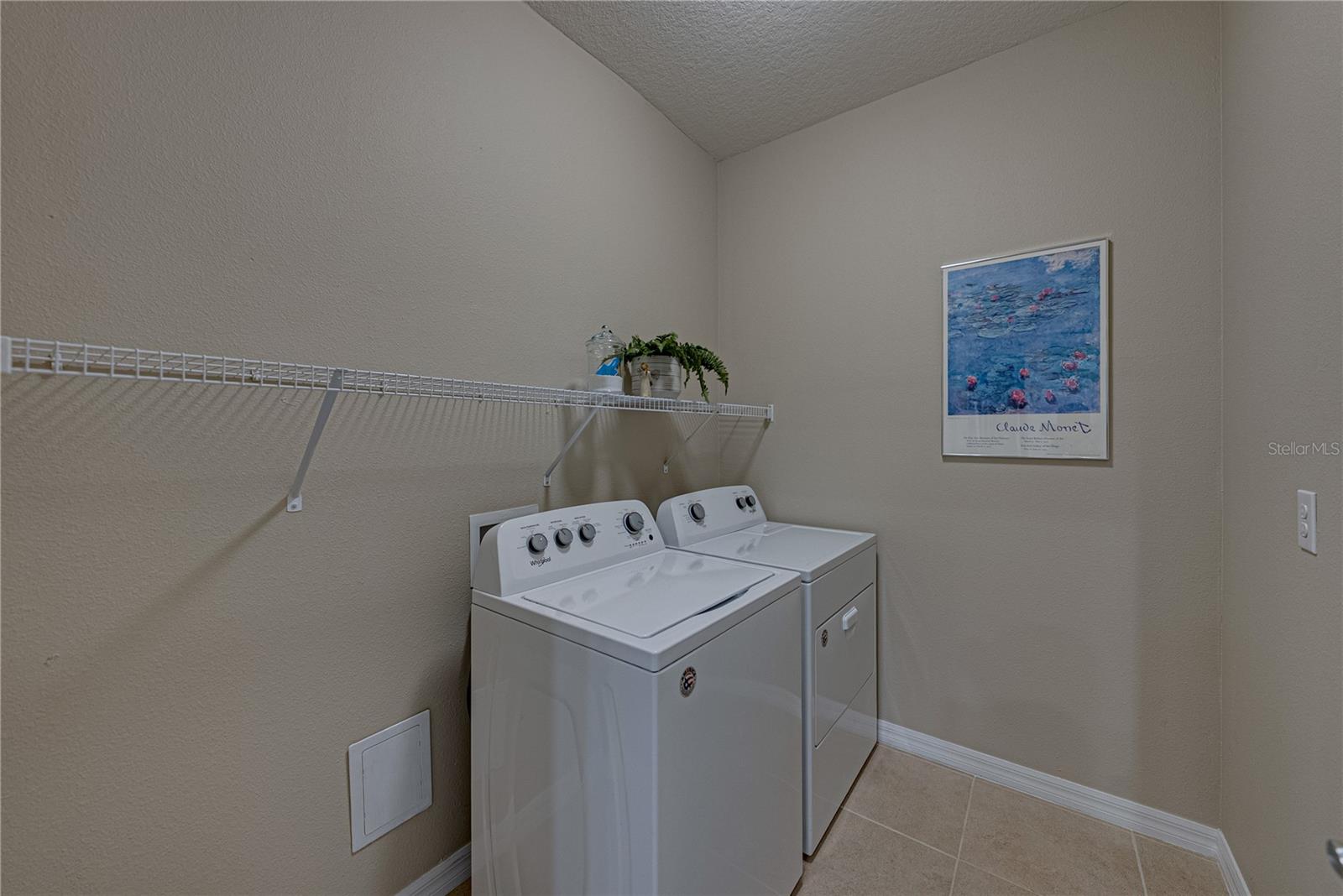 Laundry room adjacent to kitchen