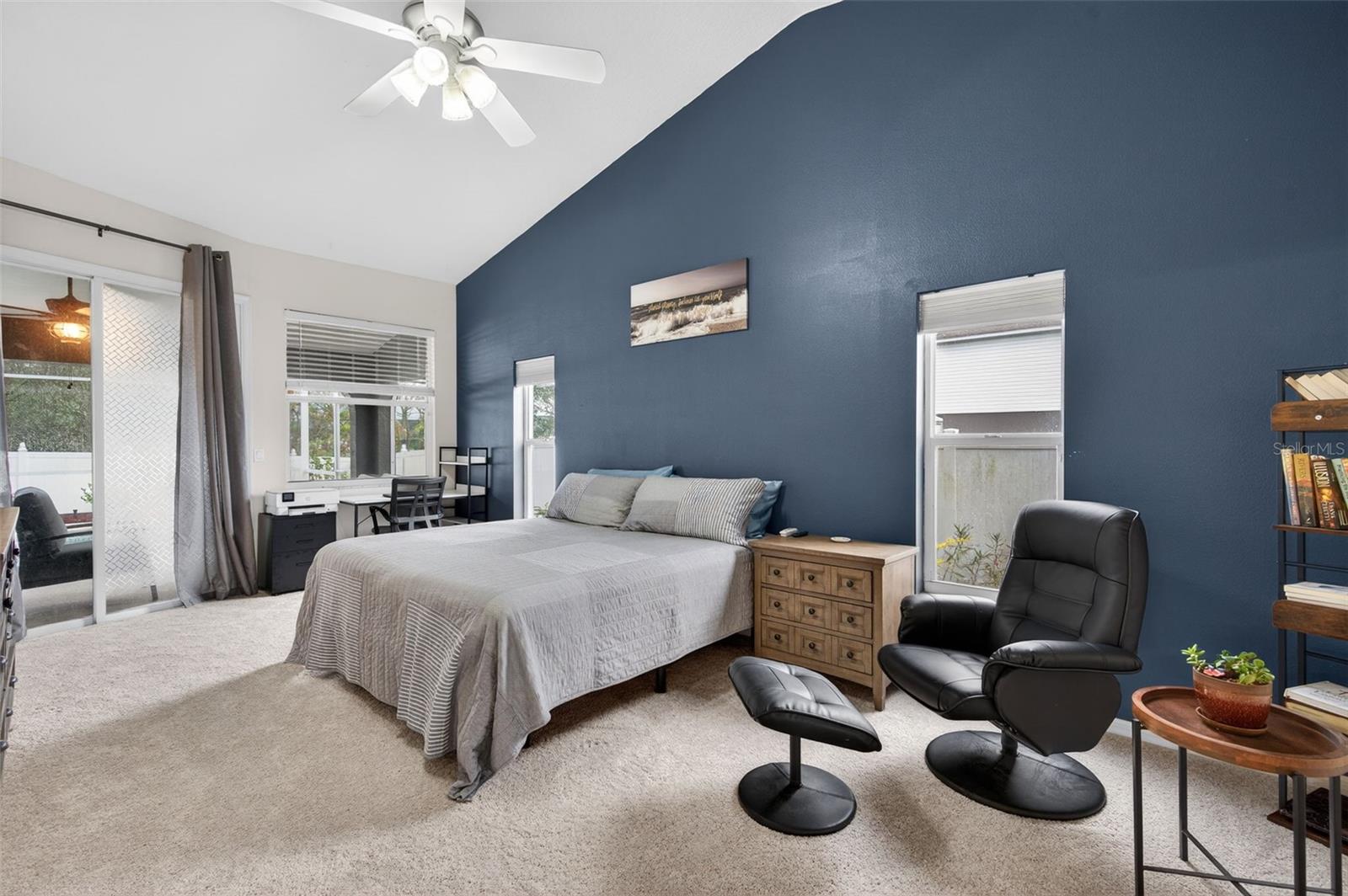 Primary Bedroom (Split Floor Plan). Slider access to Lanai and Pool Area.