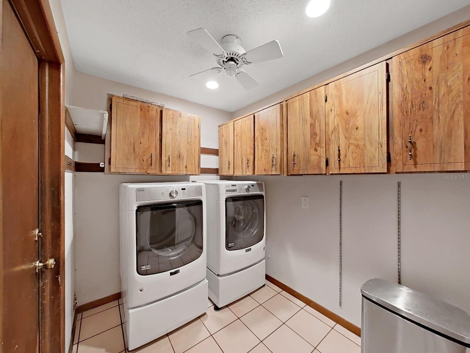 Inside Laundry Room with Washer and Dryer