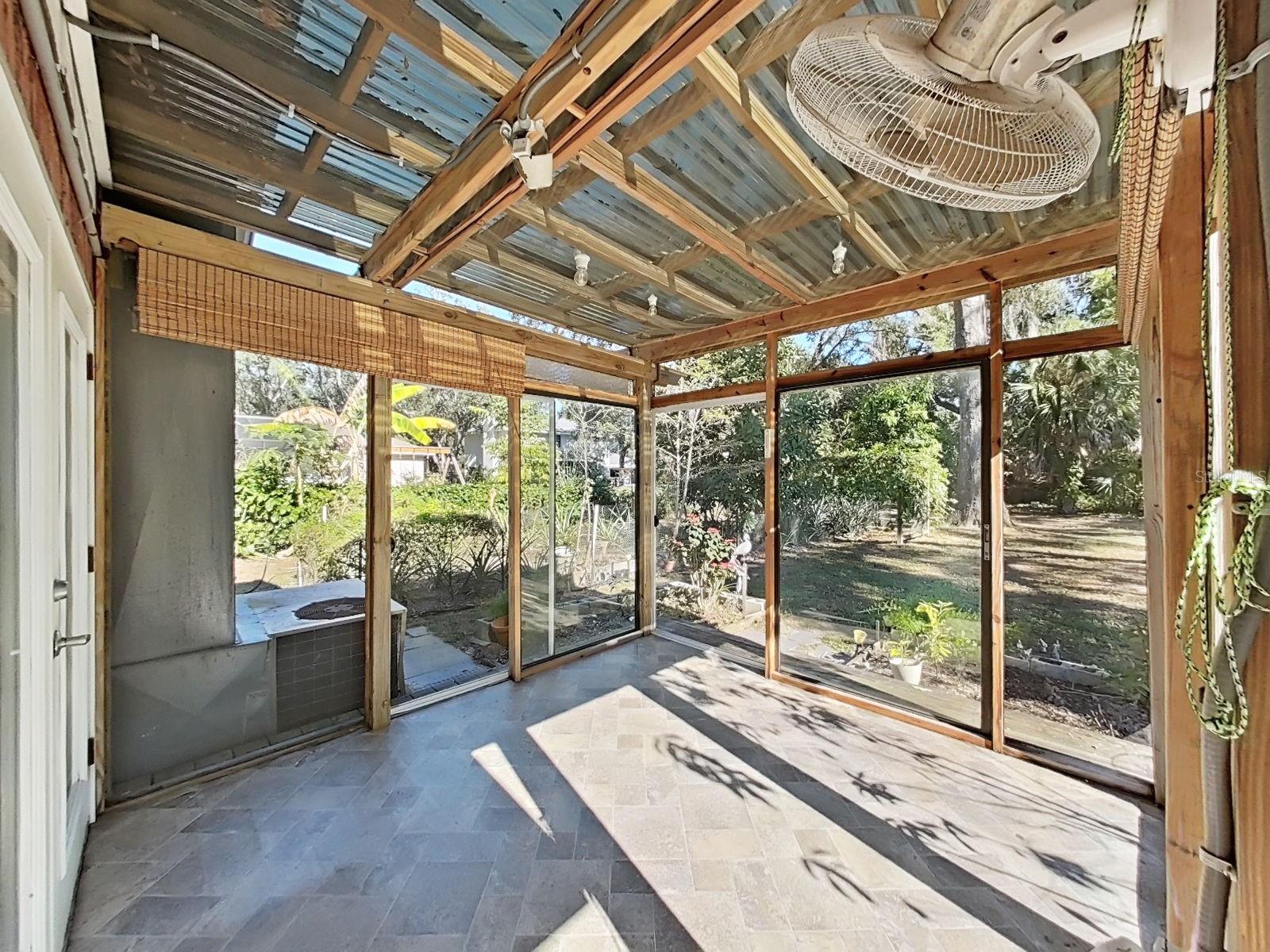 Guest House Private, Covered Back Porch open to Fenced Yard with Lots of Fruit Trees!