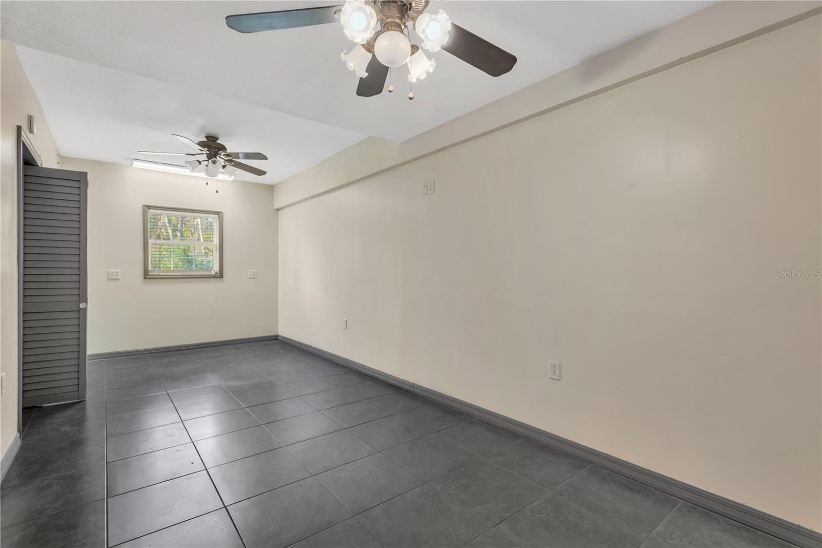 Bedroom #3 has plenty of room for a sitting area or private gym.