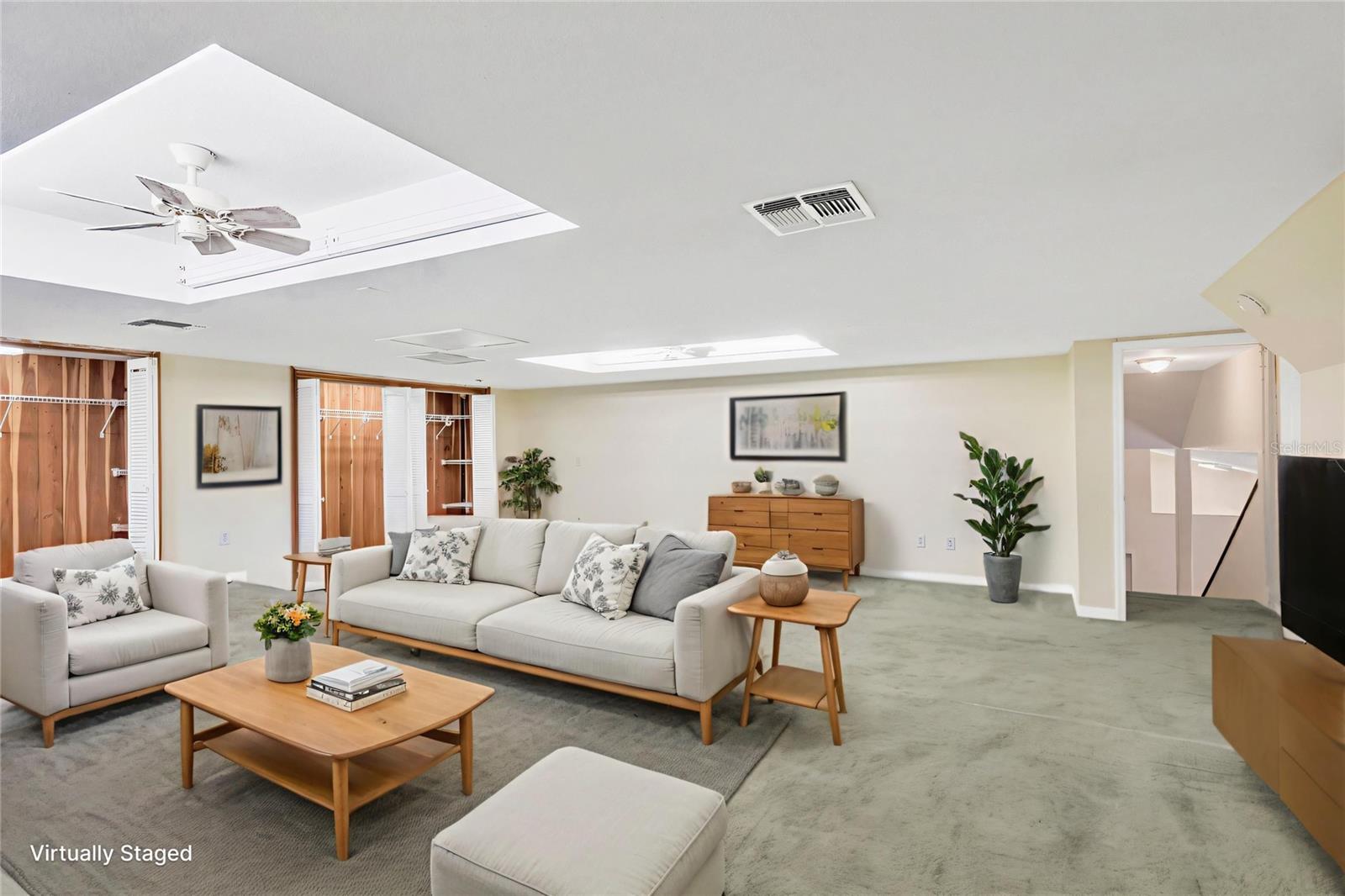 Upstairs loft staged as a family room.