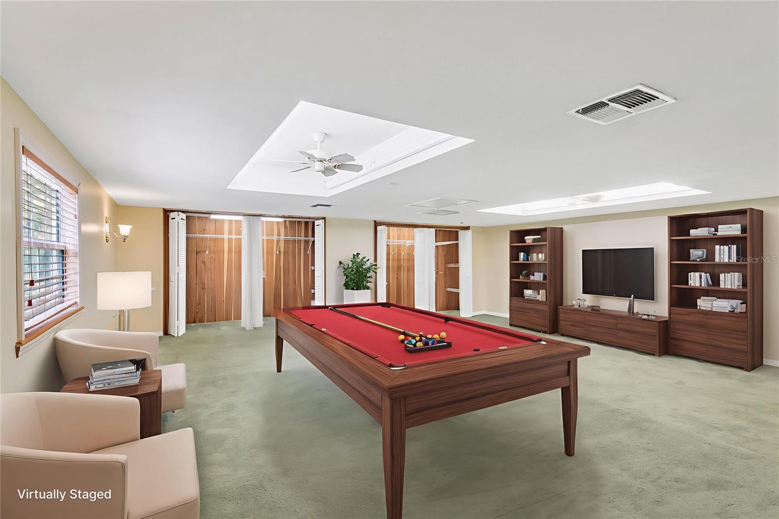 The upstairs loft is a flexible bonus room for a game room, office, family room or a combinations of all.  5 Cedar-lined closets in the loft provide lots of storage.