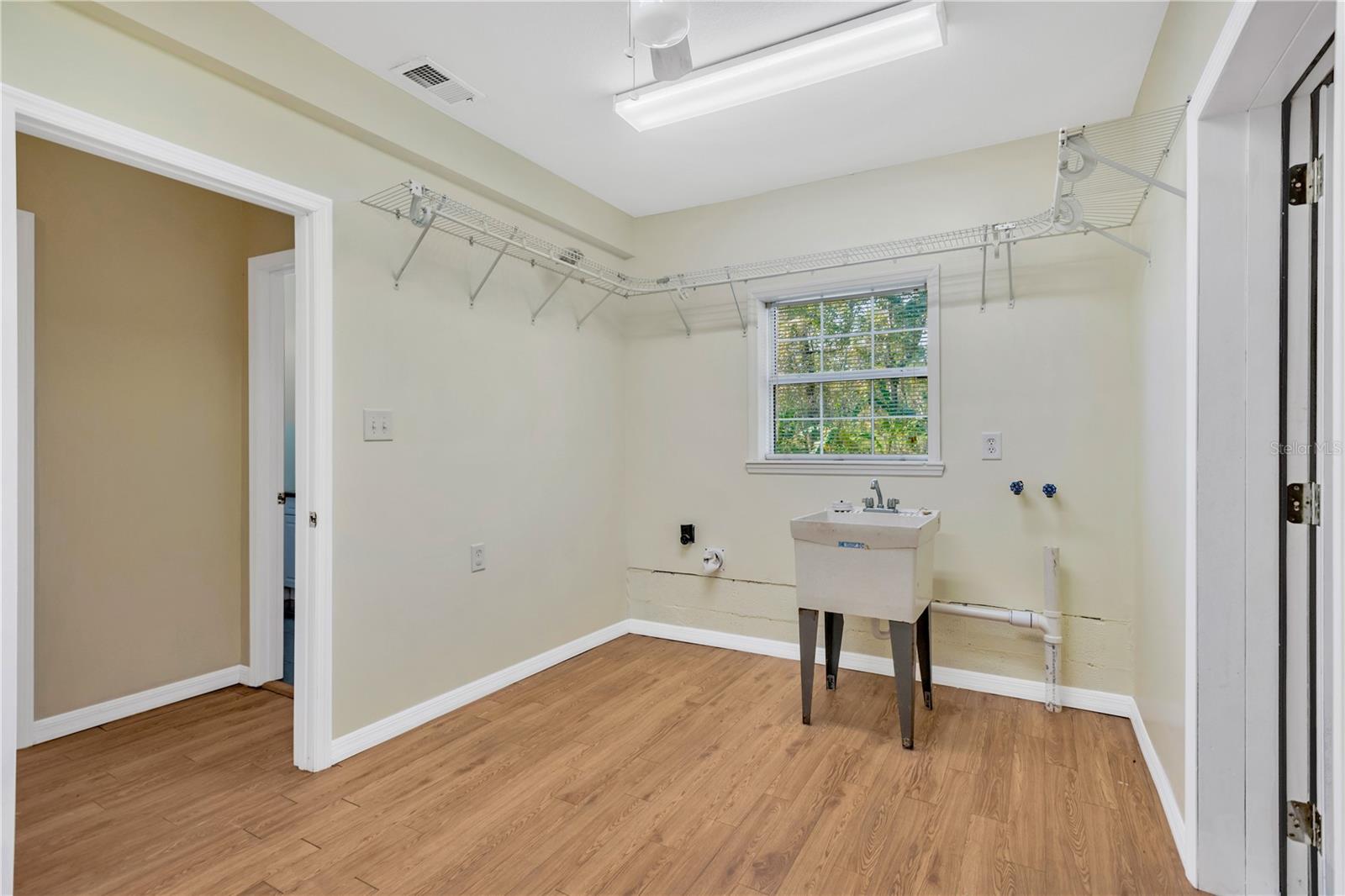Laundry room with utility sink