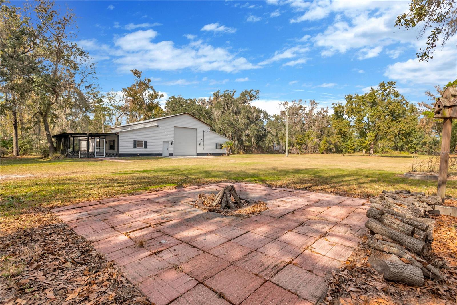 Buyers will enjoy a welcoming firepit adds a family-friendly touch.