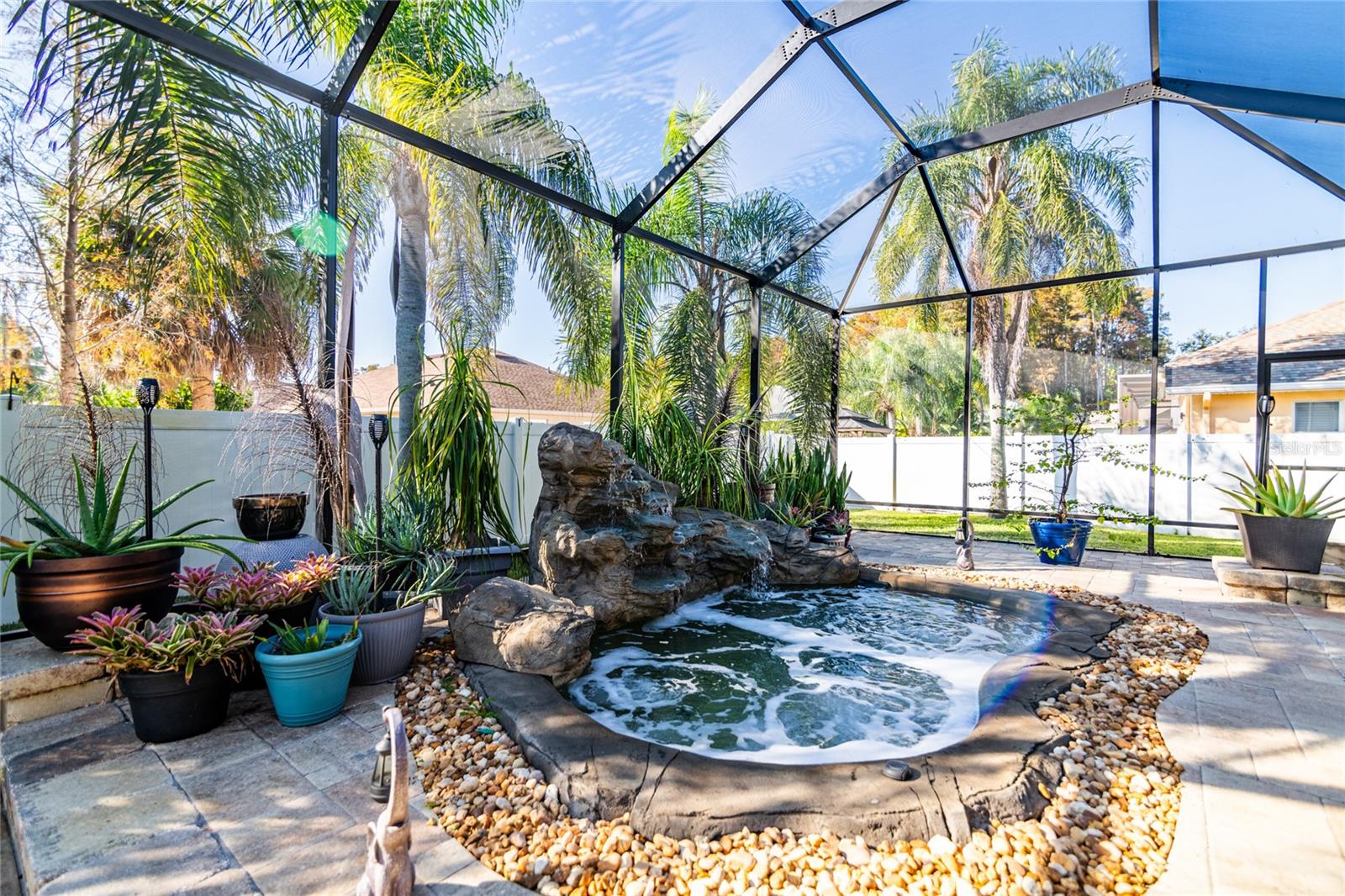 Mesmerizing hot tub with waterfall.