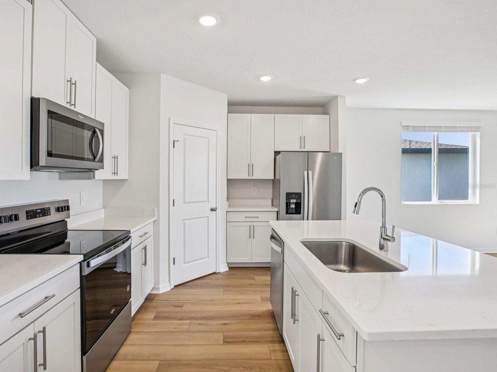 Interior photos are not of the actual home but are photos of the builder home with the same floorplan with similar interior finishes and features.