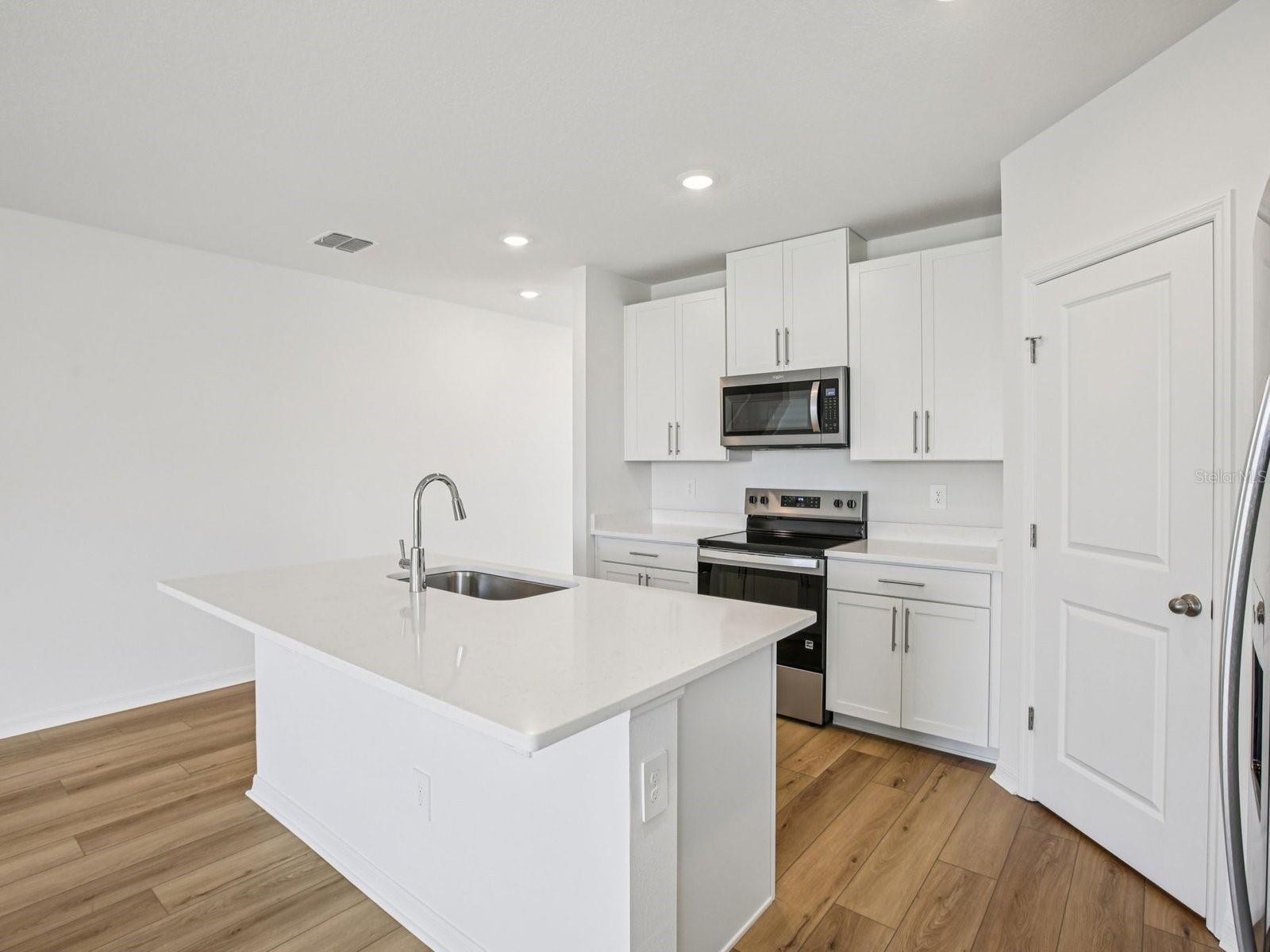 Interior photos are not of the actual home but are photos of the builder home with the same floorplan with similar interior finishes and features.