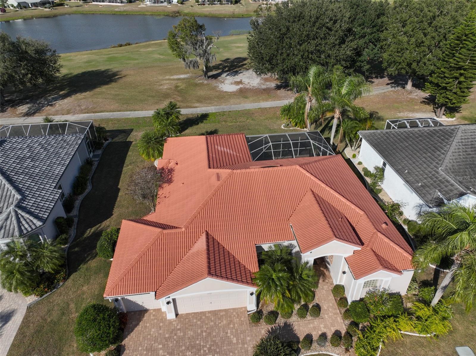 Aerial of Home Renaissance Golf Course & Pond View, 3 Car Garage, Pavered Drive & Walkway