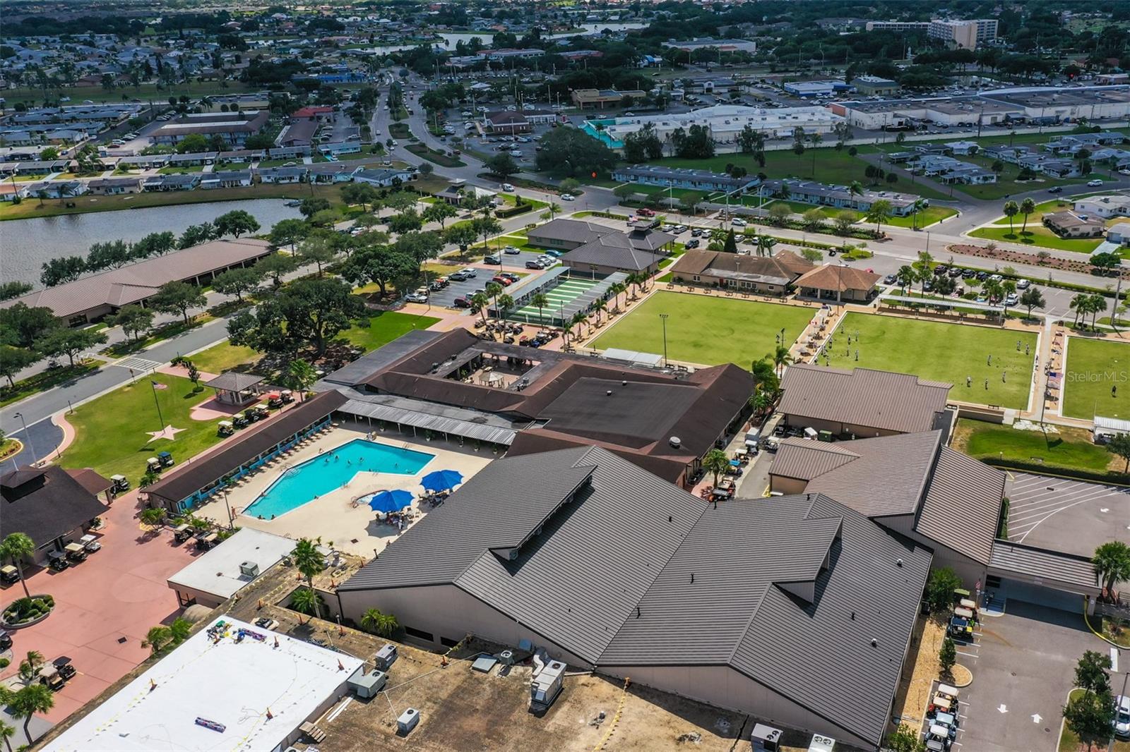 Aerial SCC Amenities: North Campus AtriumState of the Art Gym, Lawn Bowling, Shuffleboard, Clubs