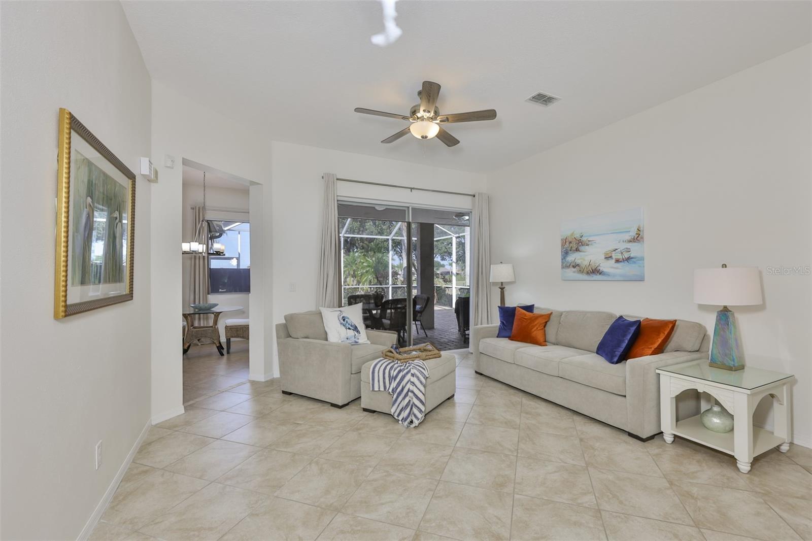 Formal Living Room, New Diagonal Tile Floor, Freshly Painted Interior, Sliders to Wonderful Outdoor Space