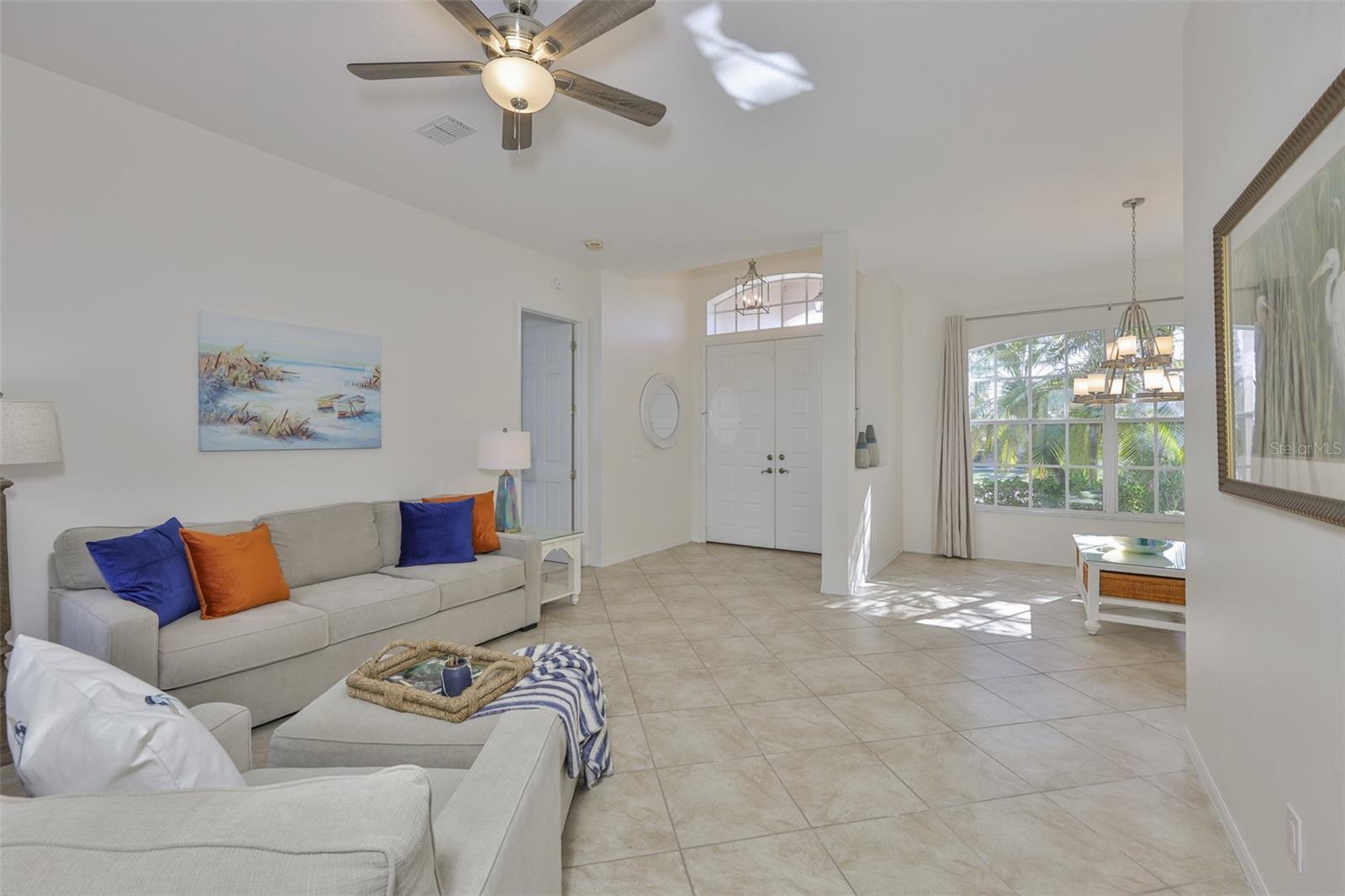 Formal Living Room, New Diagonal Tile Floor, Freshly Painted Interior,  Sliders to Wonderful Outdoor Space