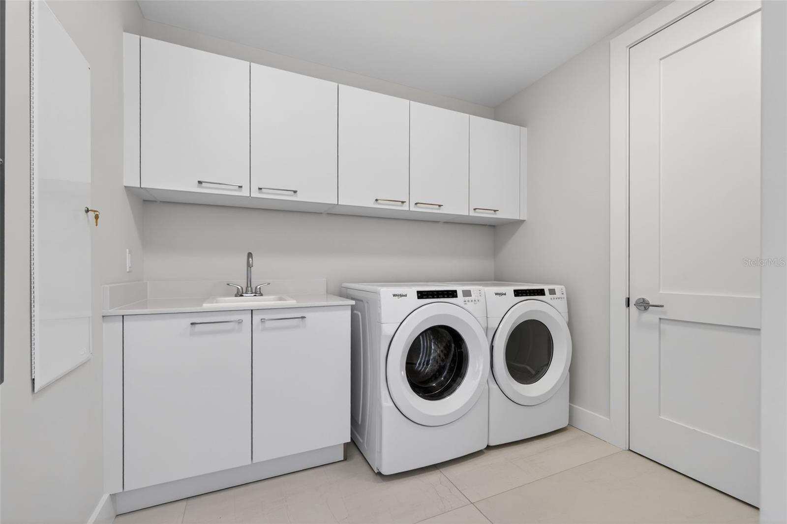 Laundry Room W/ Storage Closet