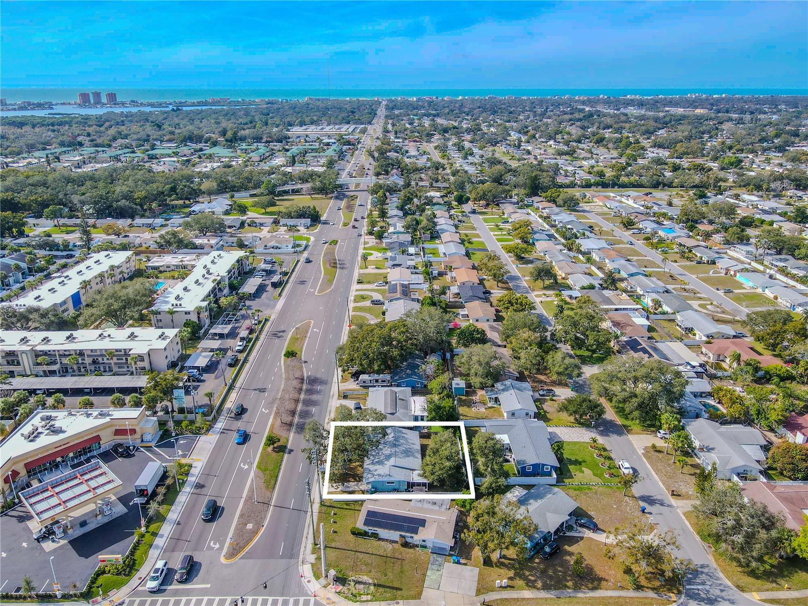Aerial view highlights the home’s convenient location near shopping and dining along Park Boulevard, with the Gulf beaches just a short drive away.