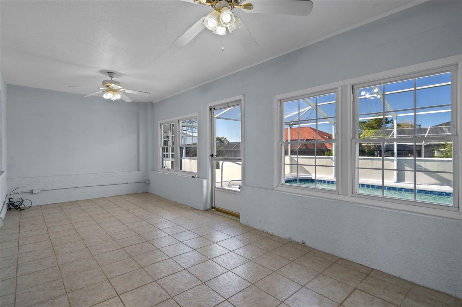 Florida room with double fans