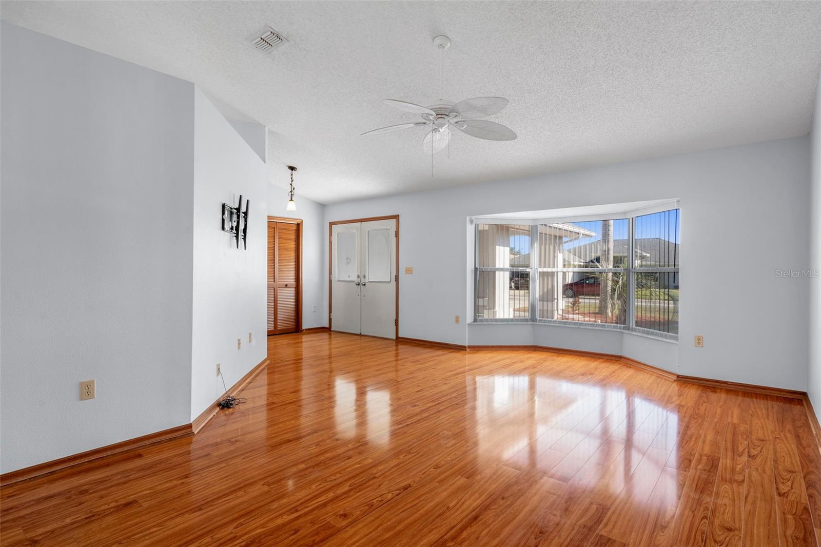 Living room looking out out of bay window onto street
