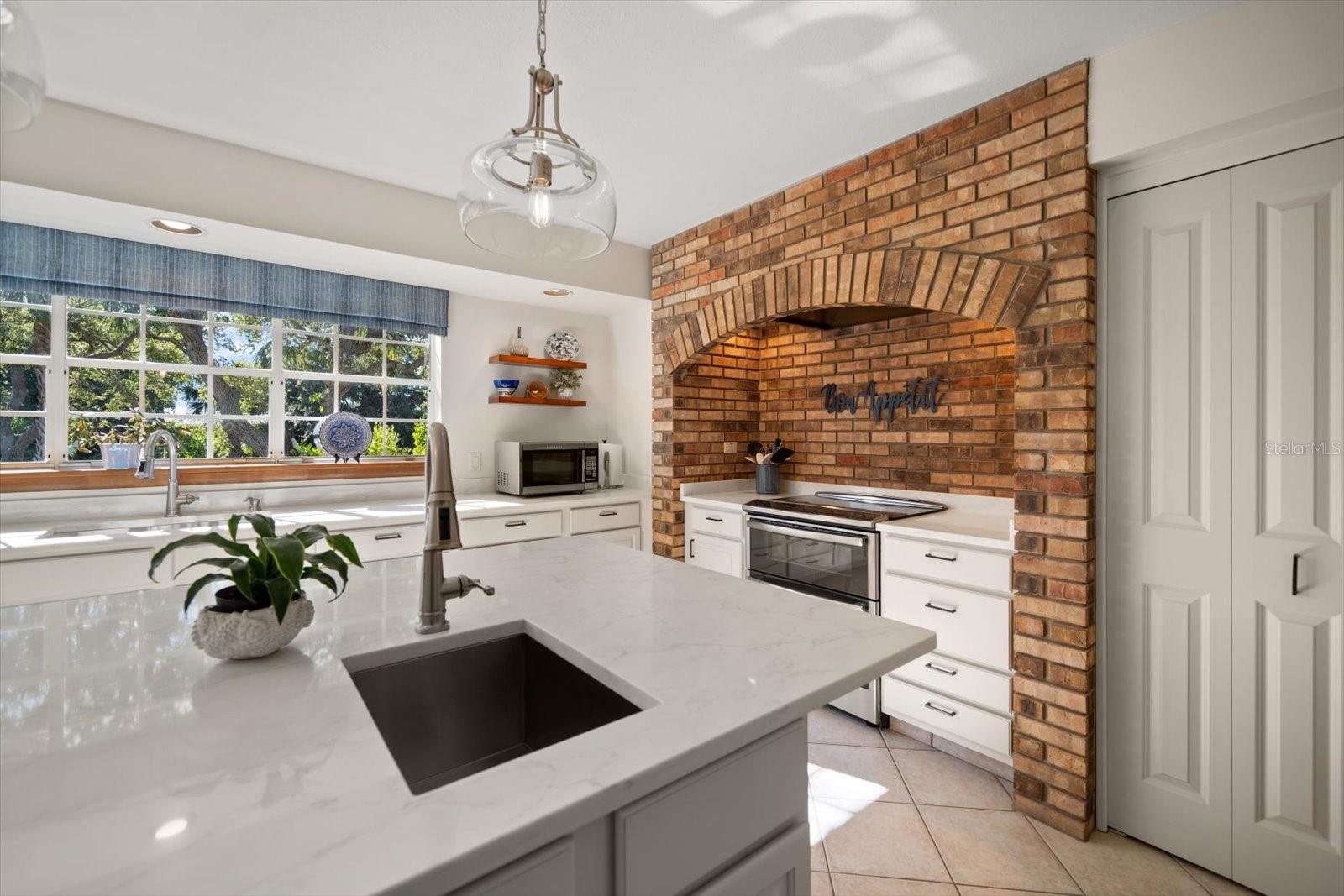 Just lovely! Cook up some fun and enjoy every minute of working in this beautiful kitchen.