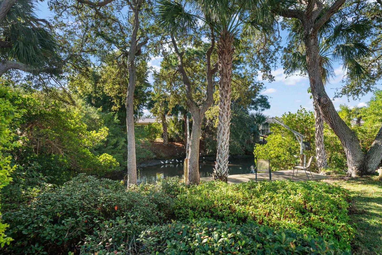 Outdoor environs include observation deck bordering small salt water canal to intracoastal- perfect for kayaks, canoes or paddle boards