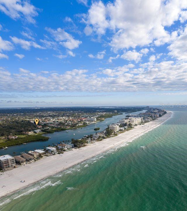 Views looking west to property from the gorgeous beaches just 5 minutes away!