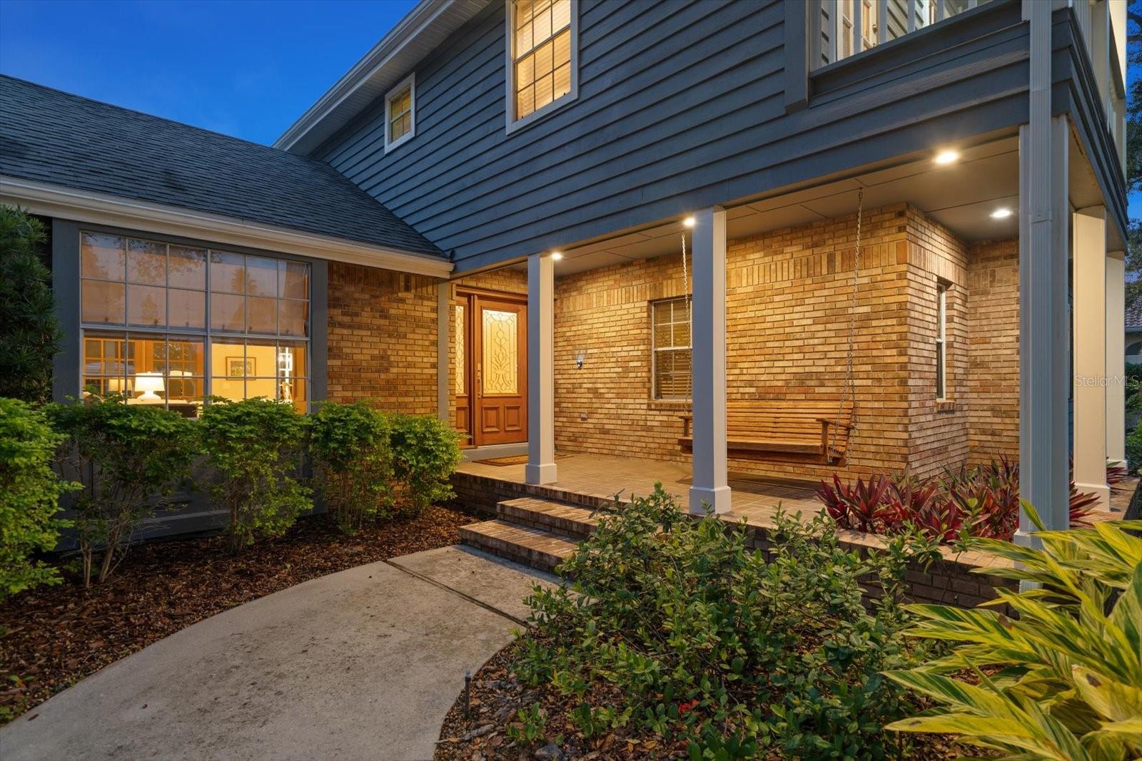 Love the front porch and swing!