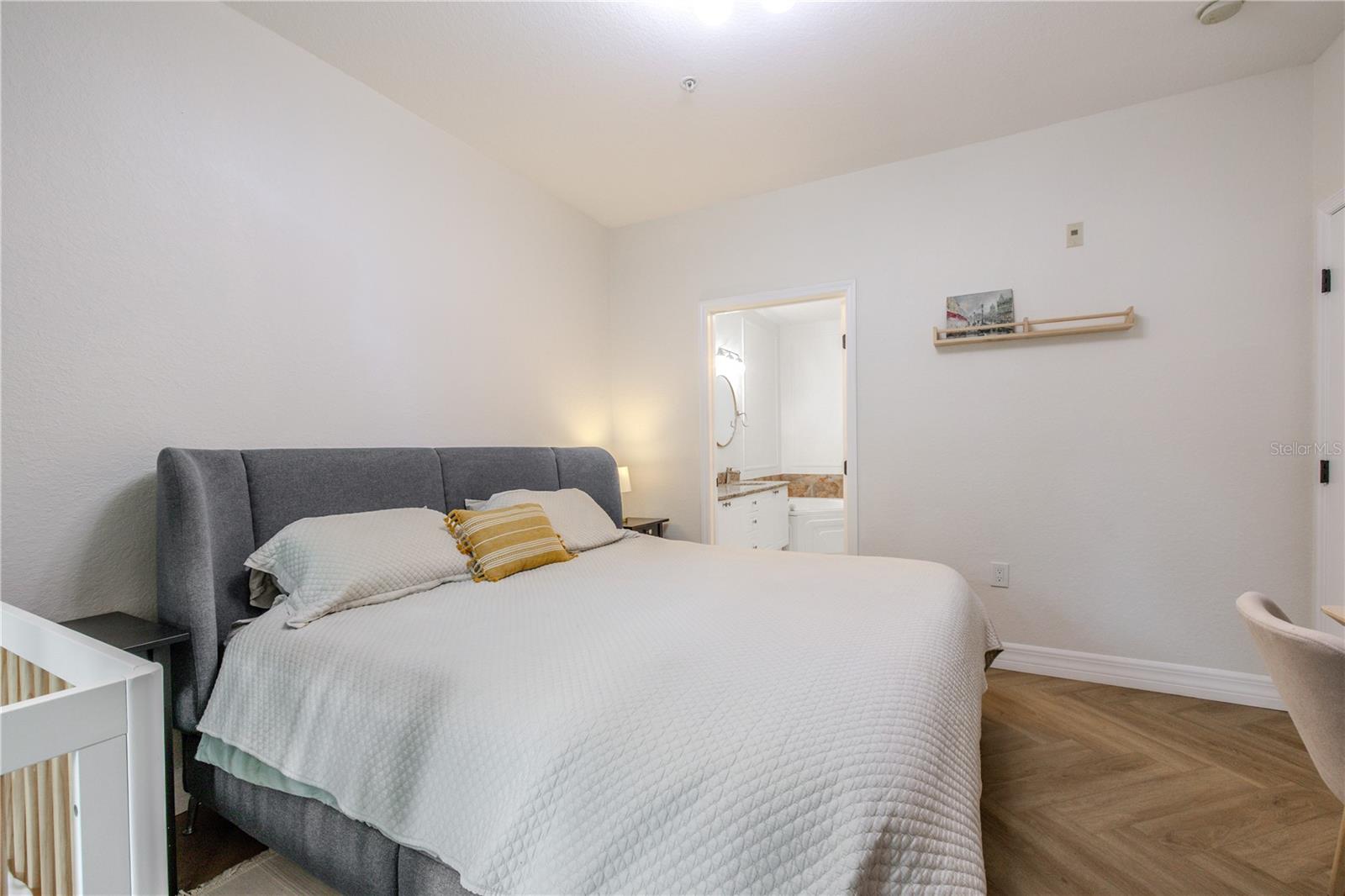 The primary bedroom with ensuite bathroom.