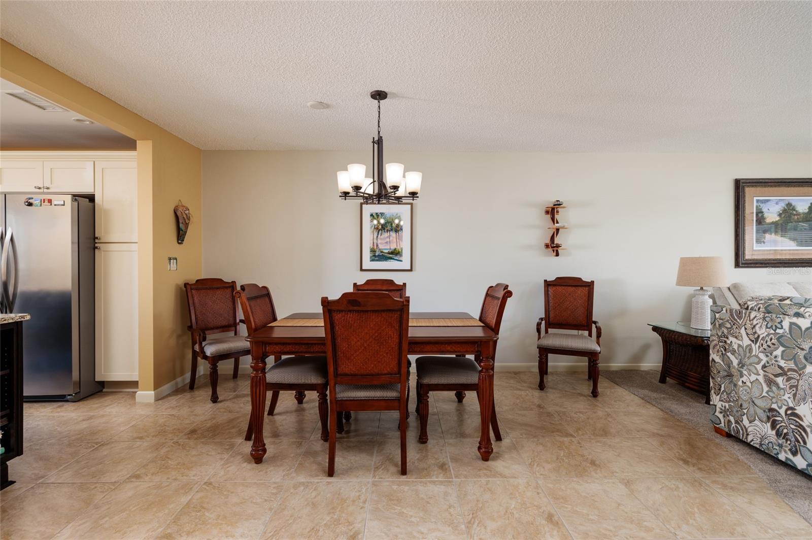 Dining area (14'x13"). Porcelain tile flooring.