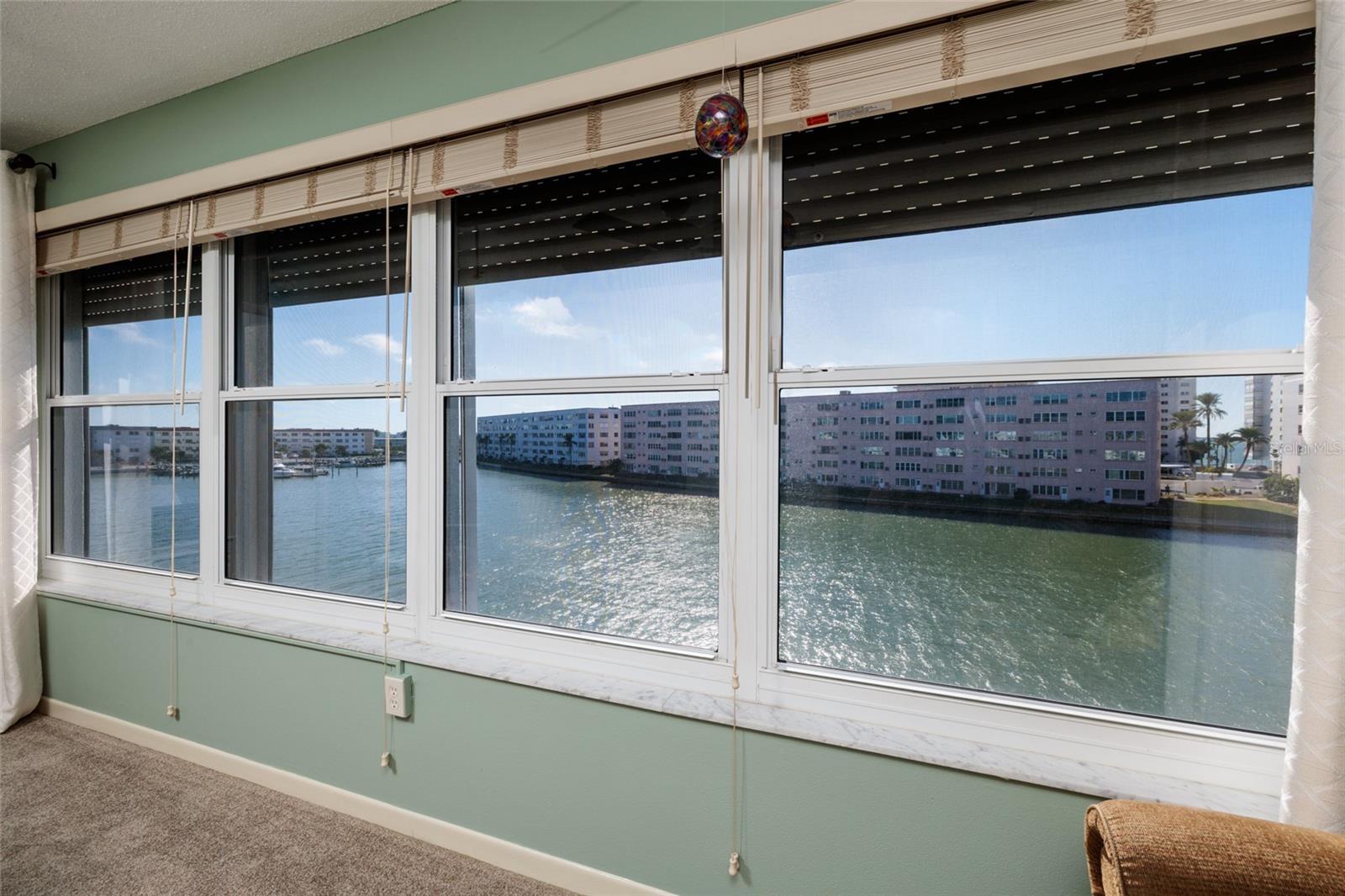Florida room impact windows also have hurricane shutters.