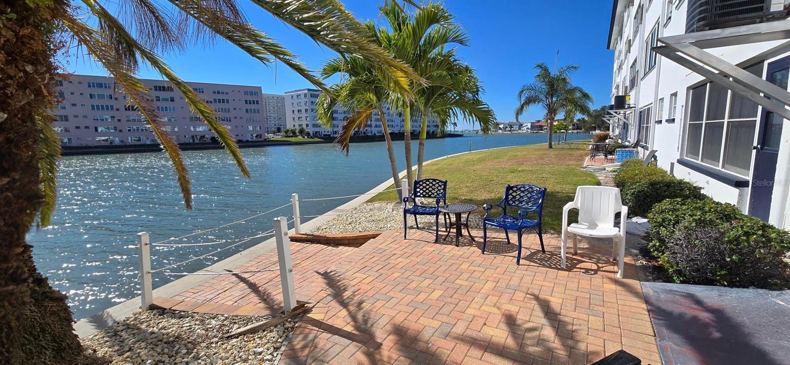 Back community patio at bldg. Restroom is just inside in hallway.