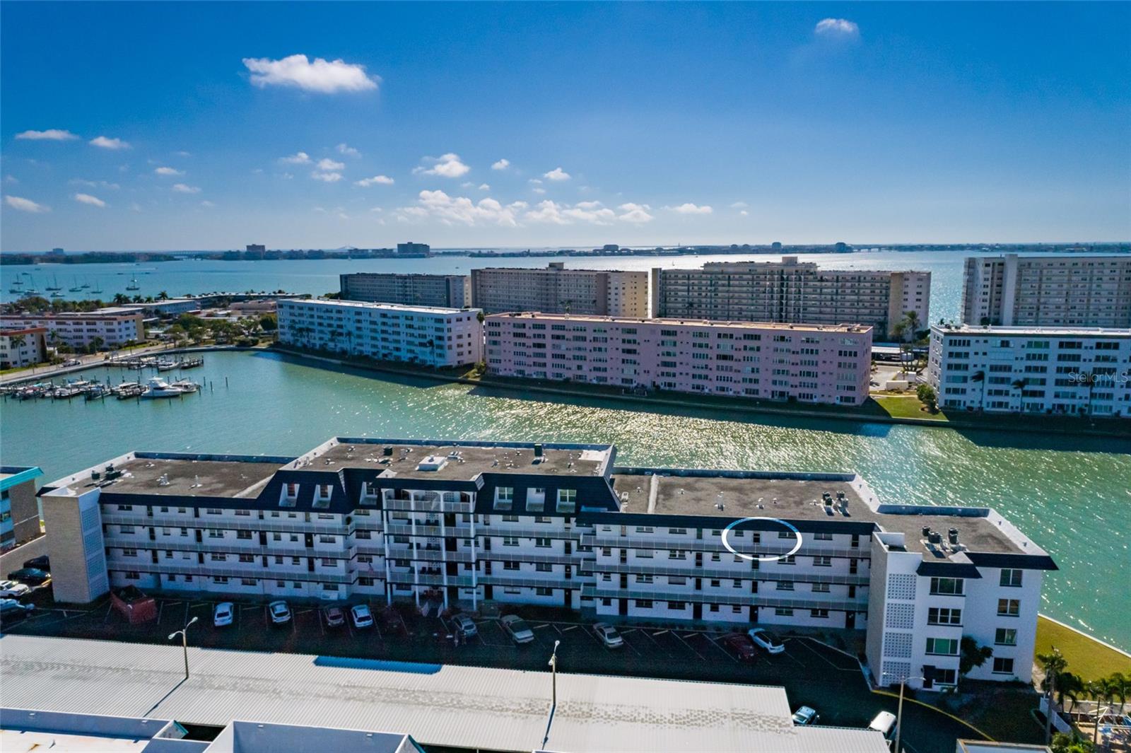 Unit #411 is a Deluxe Unit (1,250 sq ft) on top floor.