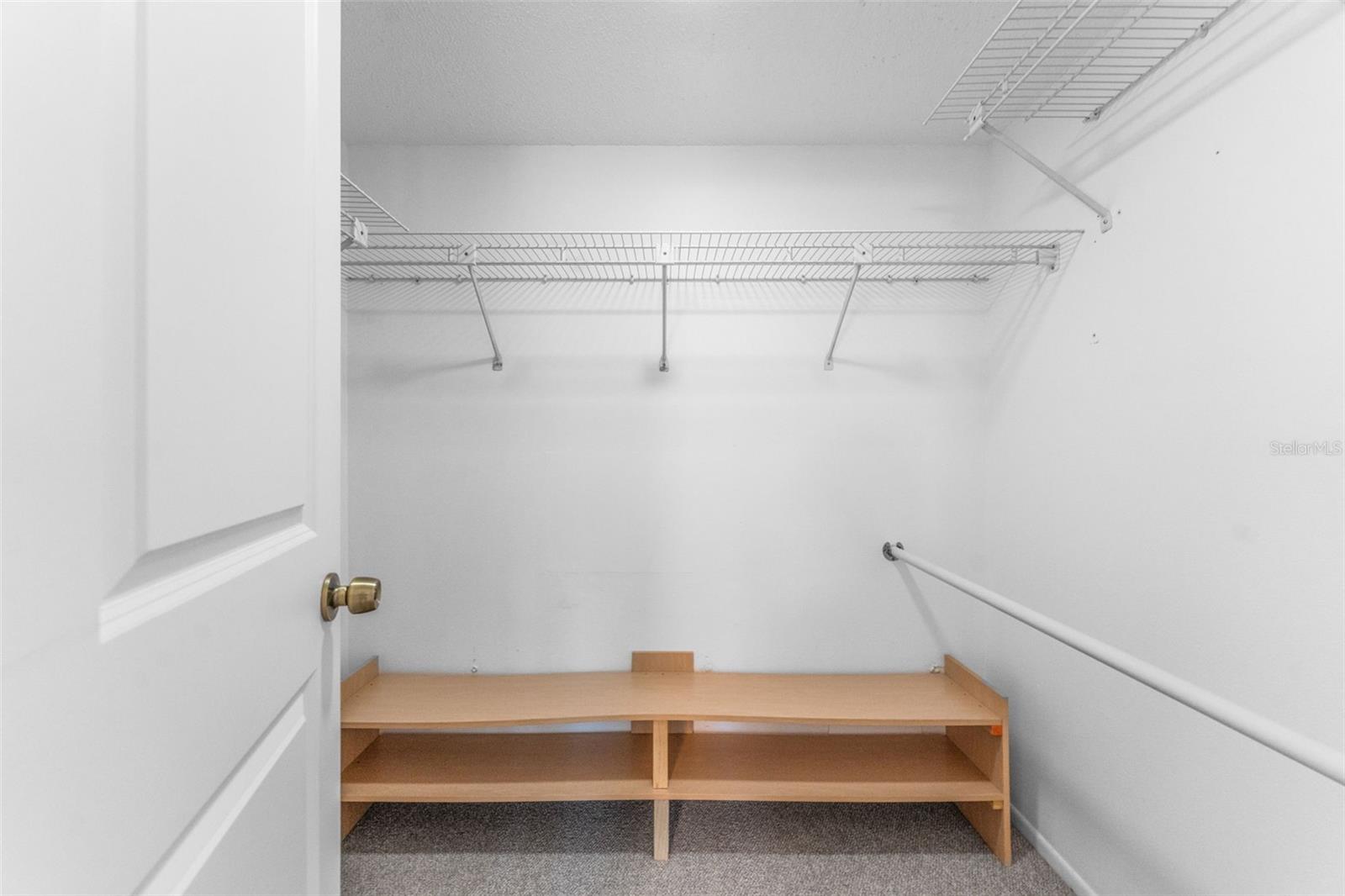 1 of 2 Primary Walk-in Closets