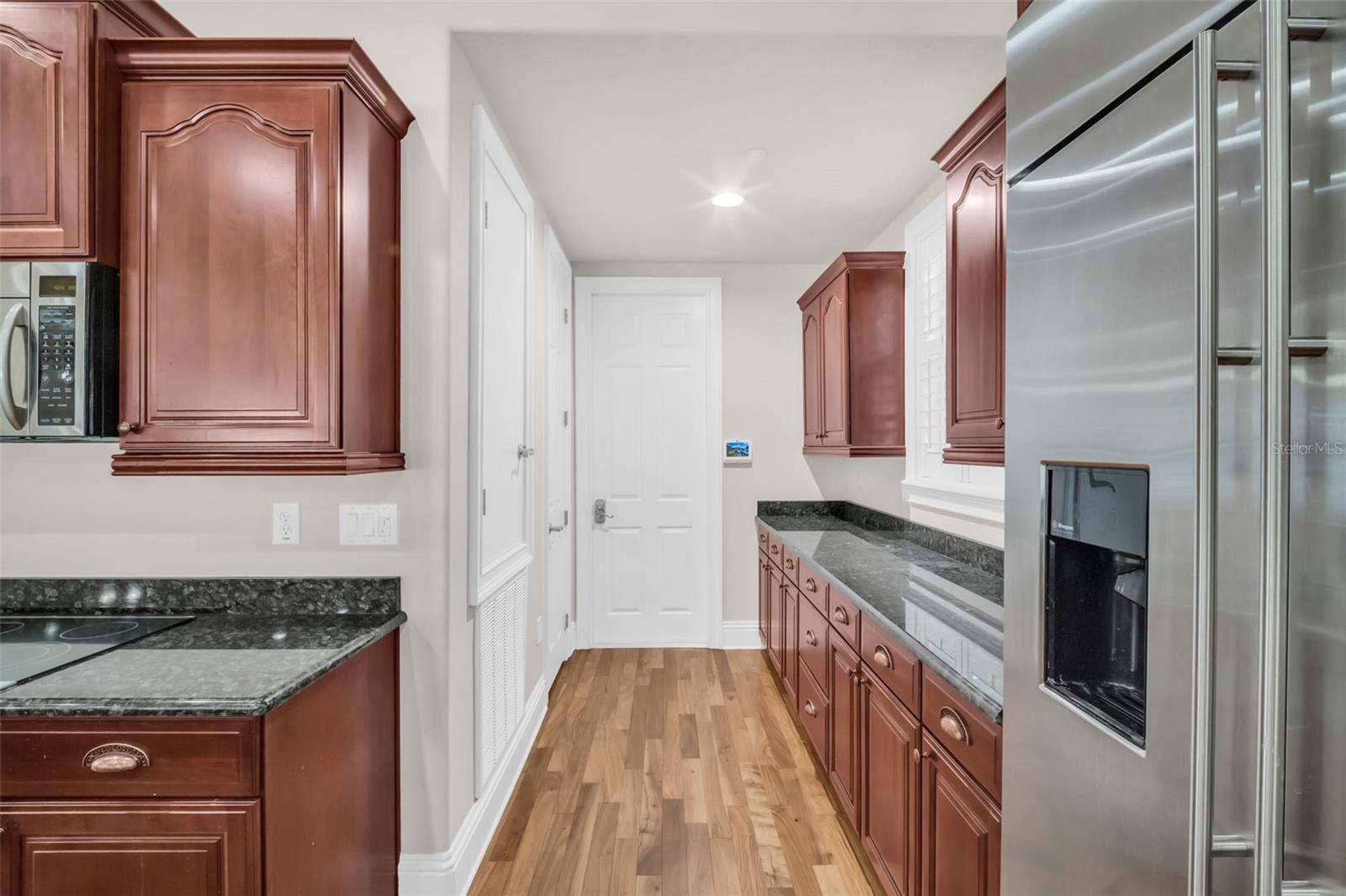 door from kitchen to Garage, w/ 2 pantries
