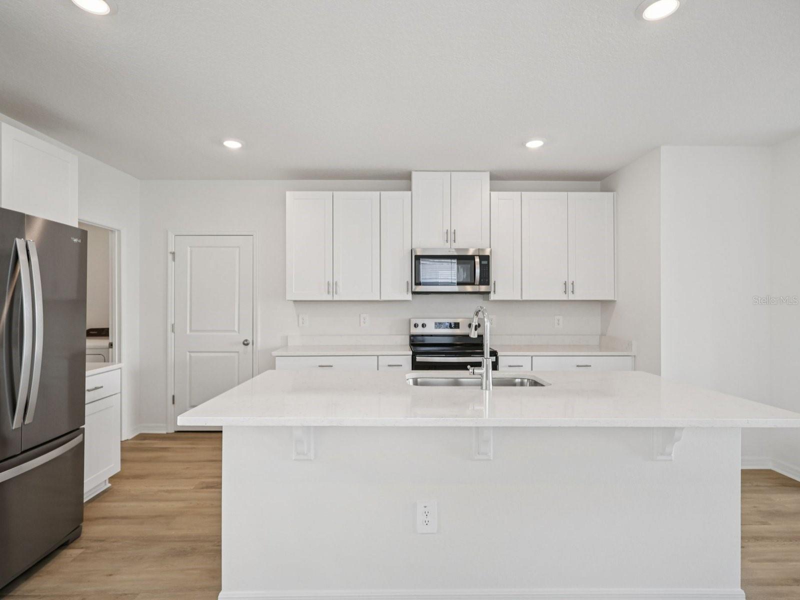 Interior photos are not of the actual home but are photos of the builder home with the same floorplan with similar interior finishes and features.