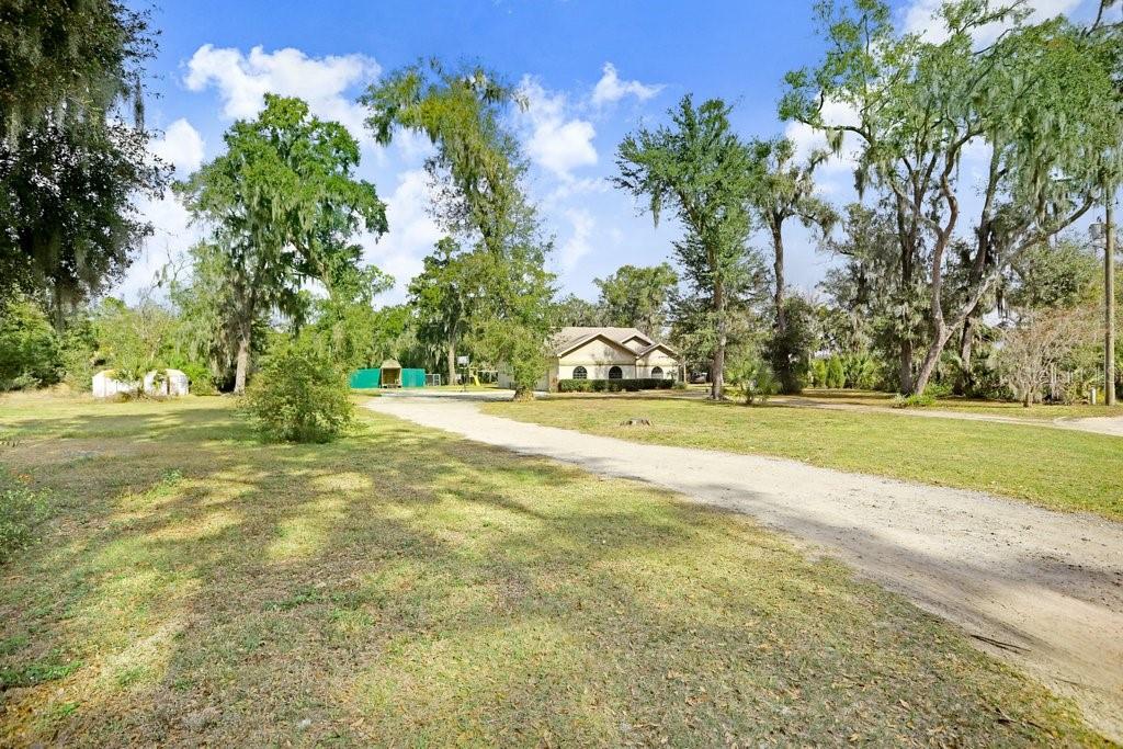 Front yard and drive to home