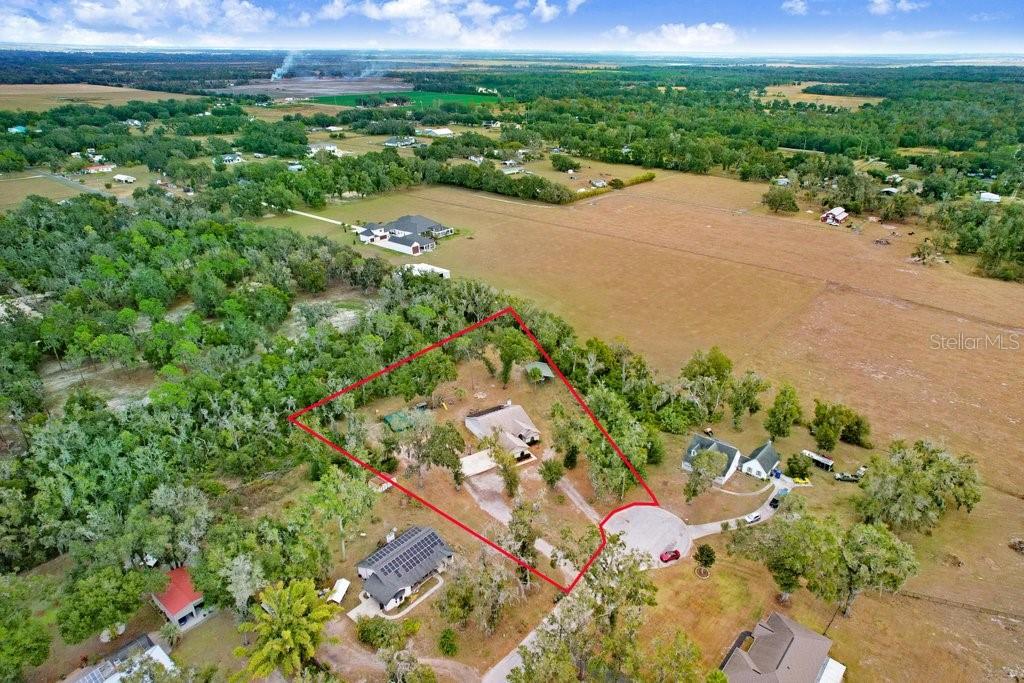 Ariel view of home and acreage