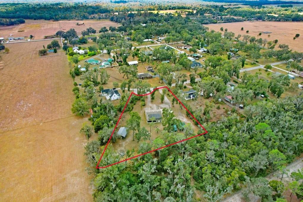 Ariel view of home and acreage