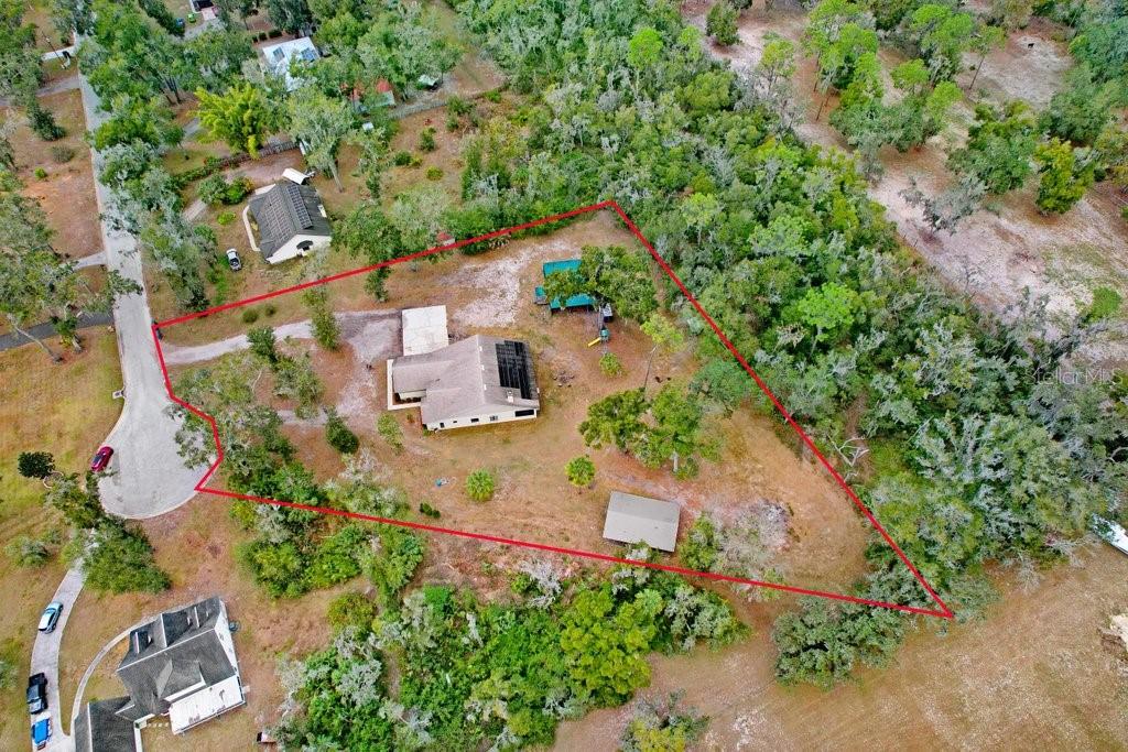 Ariel view of home and acreage