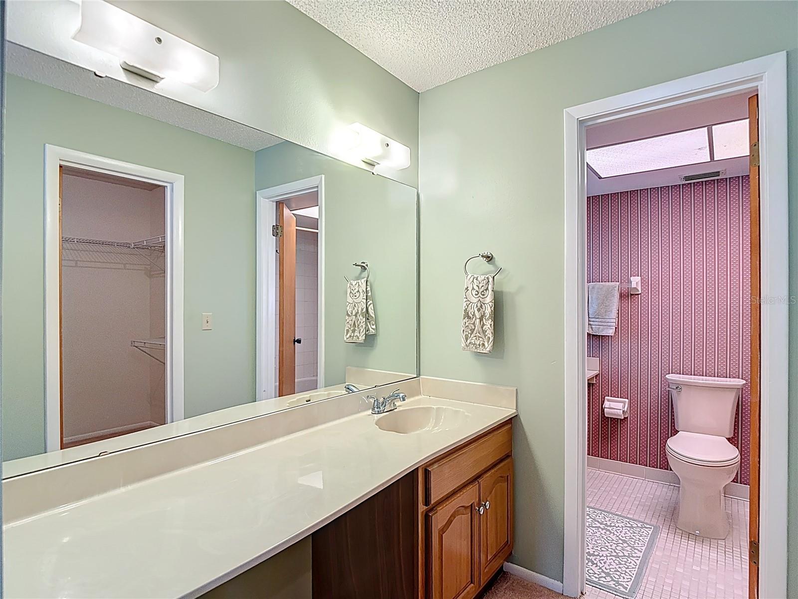 Primary bathroom with extra vanity