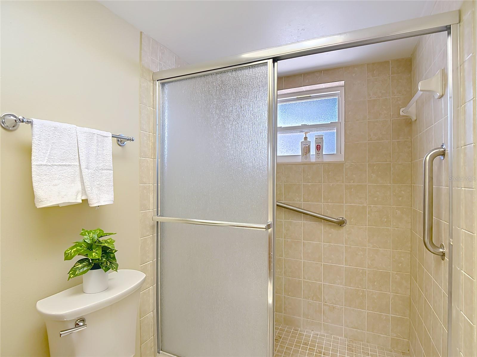 second bathroom with walk-in shower