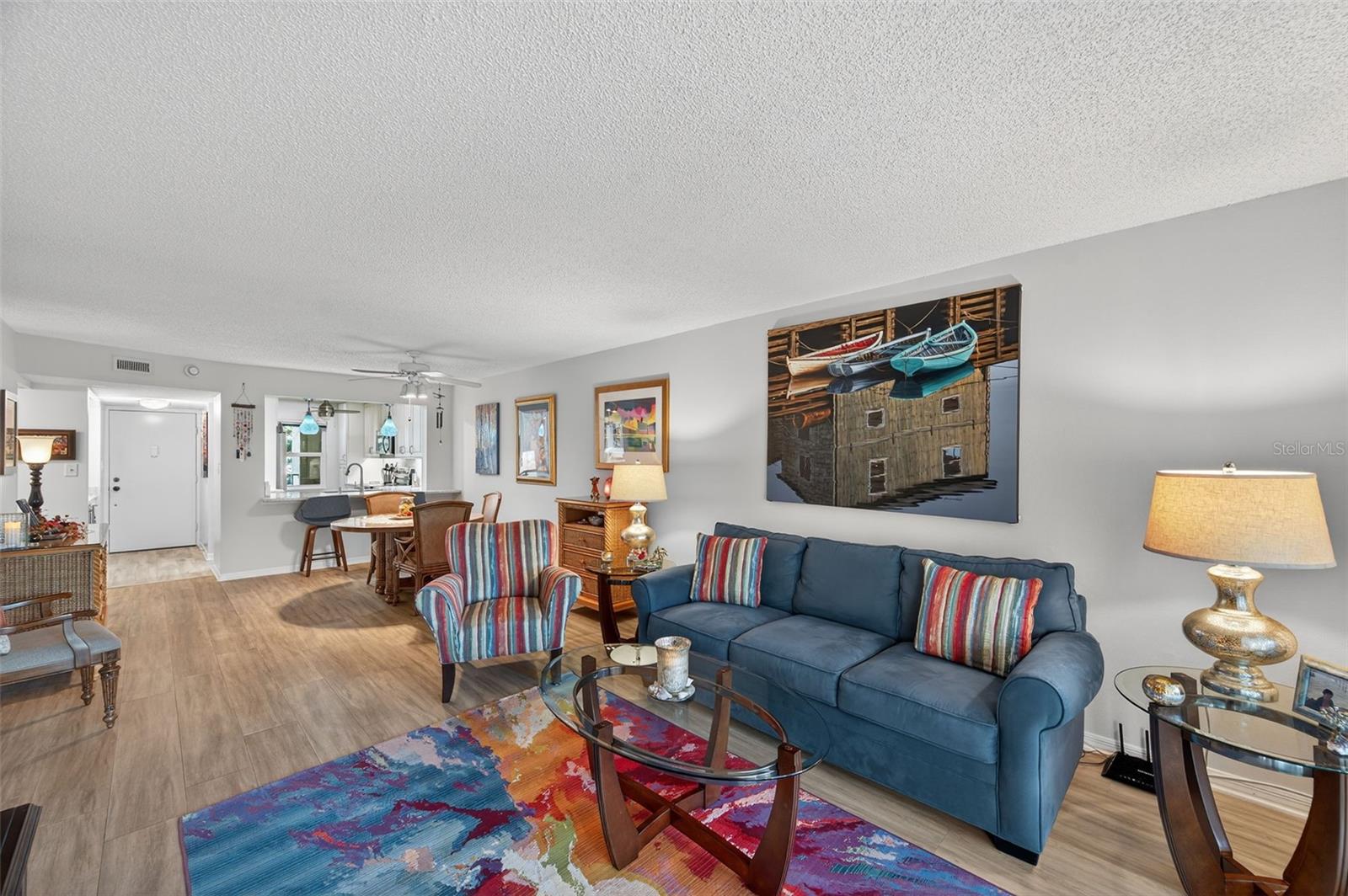 Living room looking back toward Kitchen and Front Entry